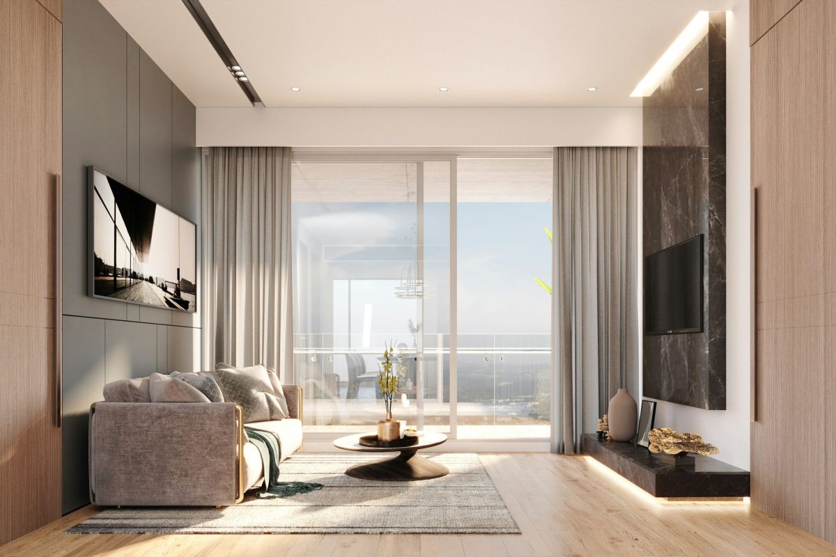 Ground-floor apartment patio with sliding glass door, gravel yard, and a view of adjacent modern buildings.