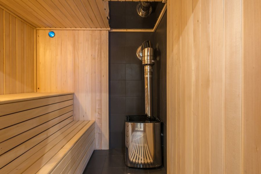 Minimalist Sauna with Steam Stove